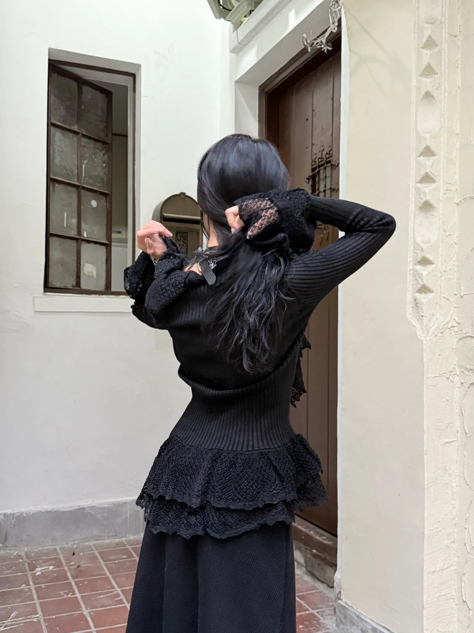 Black slim knit long sleeve top cardigan with ruffled edge