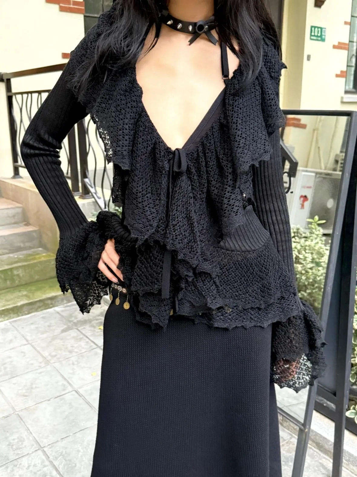 Black slim knit long sleeve top cardigan with ruffled edge