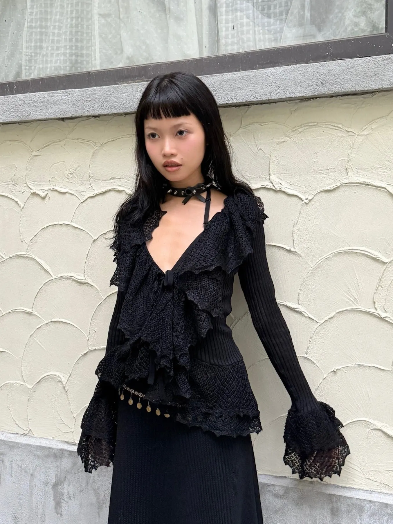 Black slim knit long sleeve top cardigan with ruffled edge