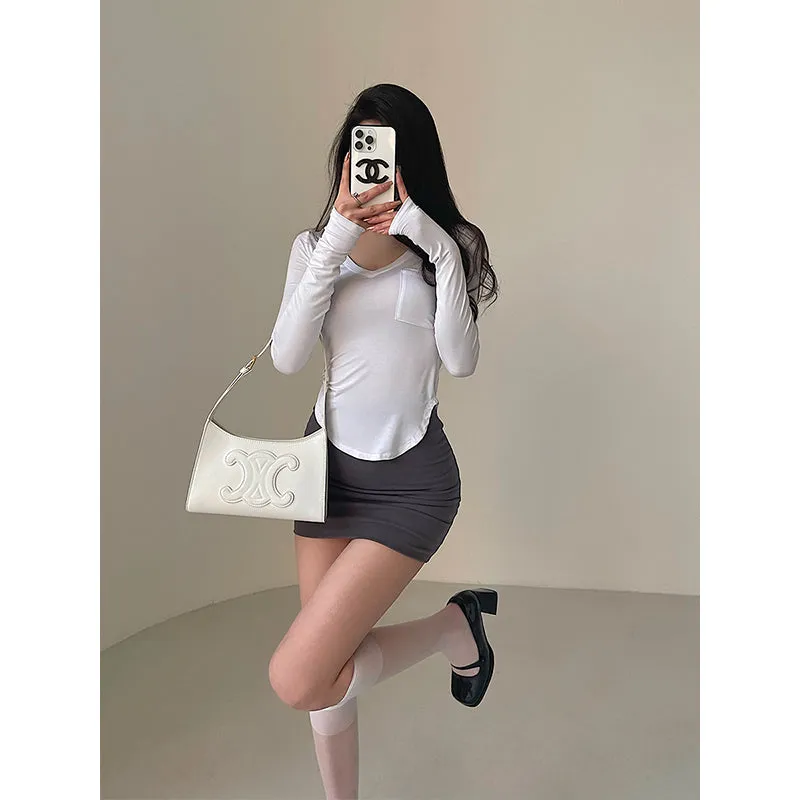 Daisy Solid Color Curved Hem Long-sleeved Slim Top