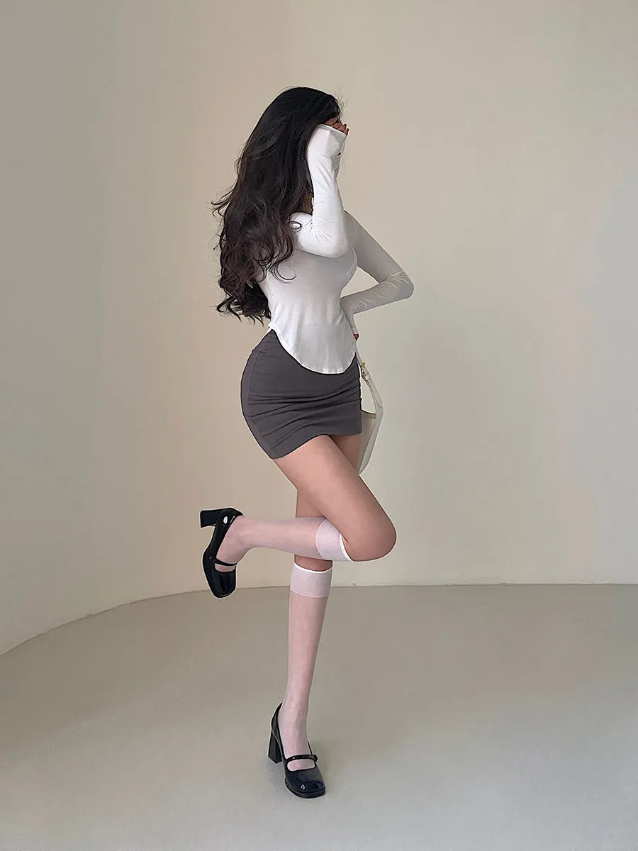 Daisy Solid Color Curved Hem Long-sleeved Slim Top