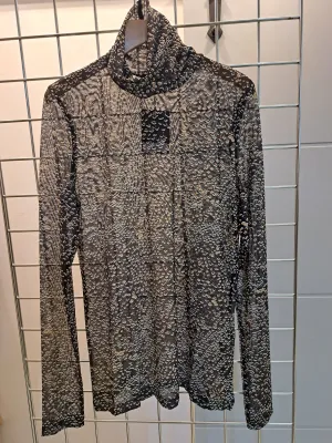Semi sheer high neck top