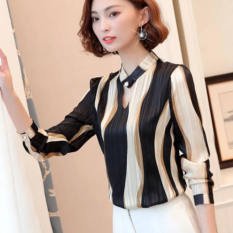 Turning Tables Stripped V-Neck Blouse