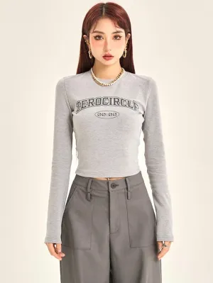ZEROCIRCLE Graphic Letter Print Long Sleeve Cropped Top